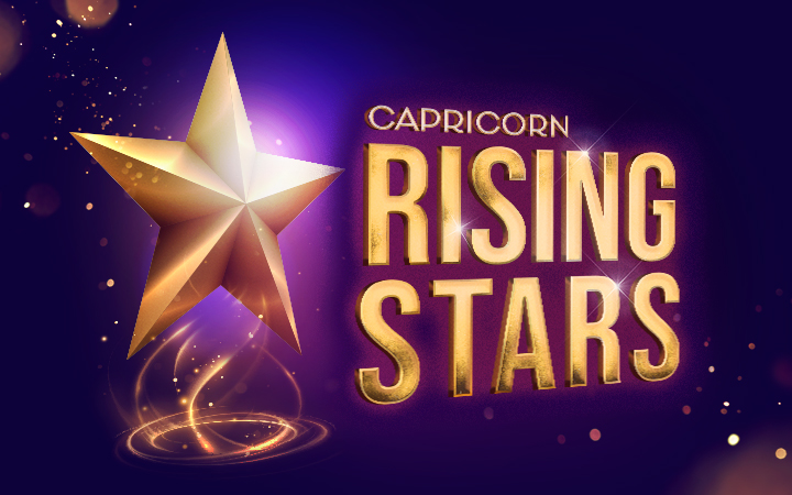 A golden star with a glowing effect on a dark blue background. The text 'CAPRICORN RISING STARS' is prominently displayed in large, golden letters next to the star.