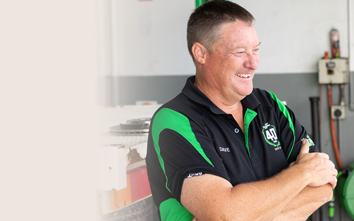 David Banning, SA/NT Member Director, smiling and standing in his workshop.